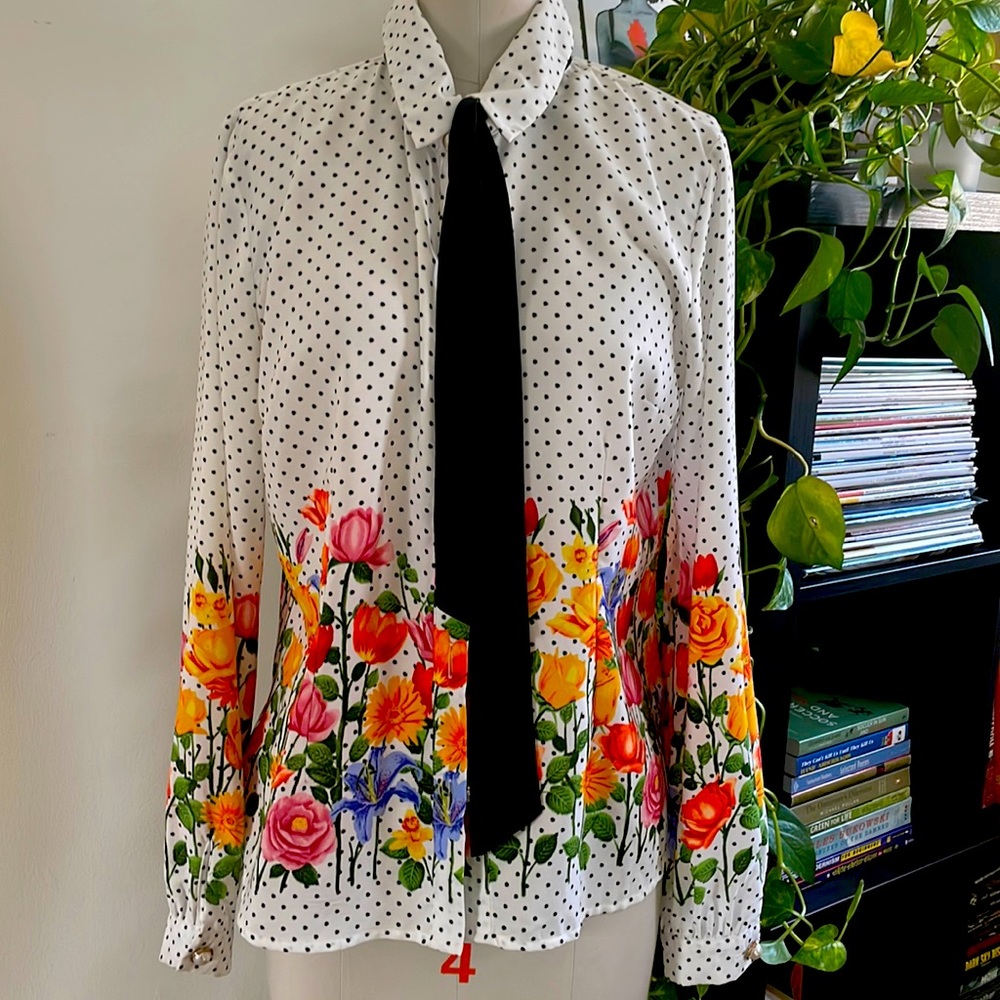 Bow tie blouse with a polka dot and flower design